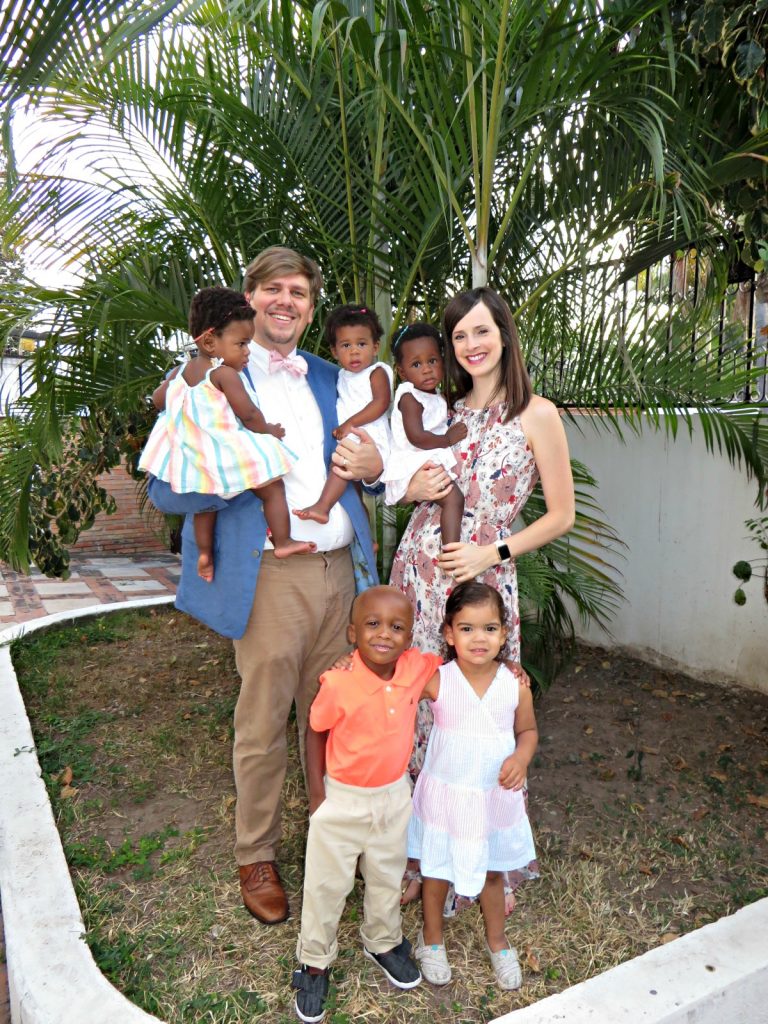 Rachel And Aaron Holding The Triplets With Their Two Older Children