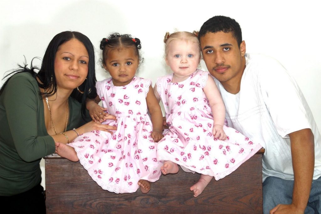 Biracial Twins With Their Parents