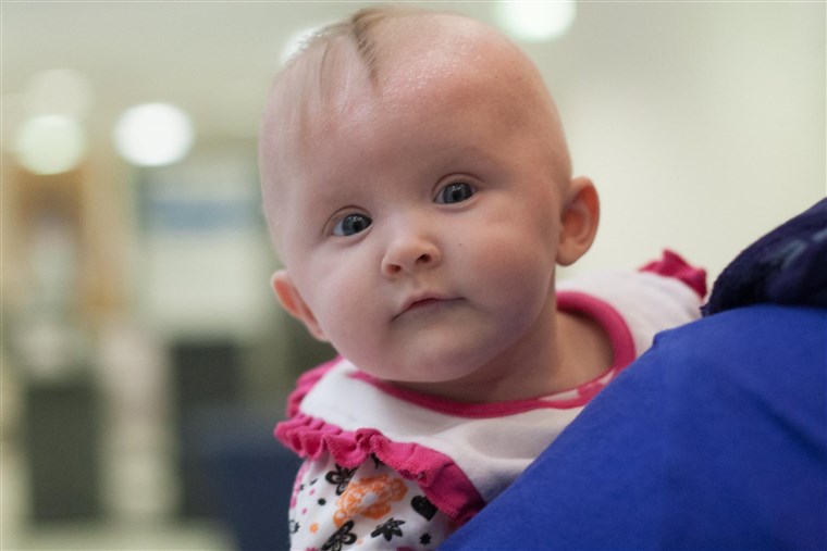 A Baby Being Held