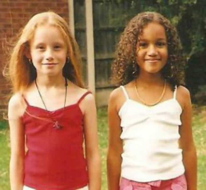 Lucy And Maria Standing Side By Side