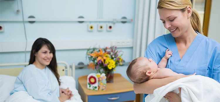 Nurse And Parent With Baby