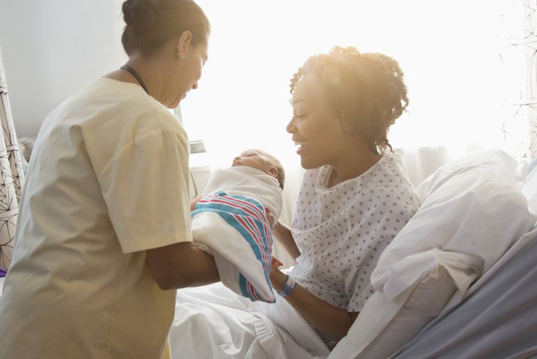 Nurse Handling Baby