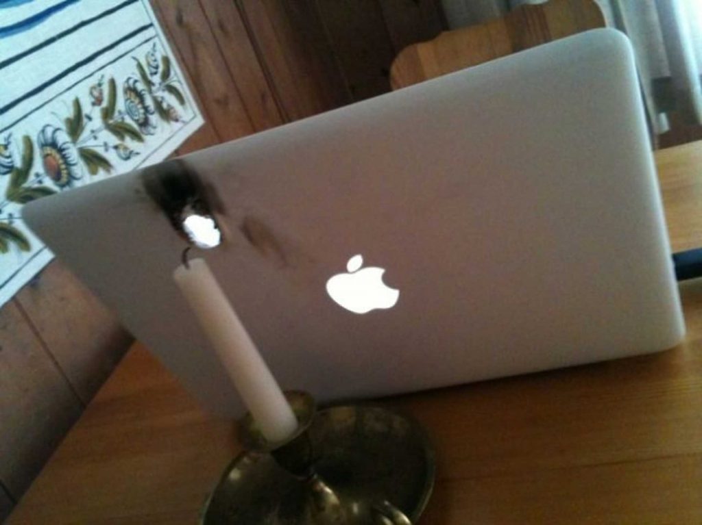 Apple Laptop Burned By Candle