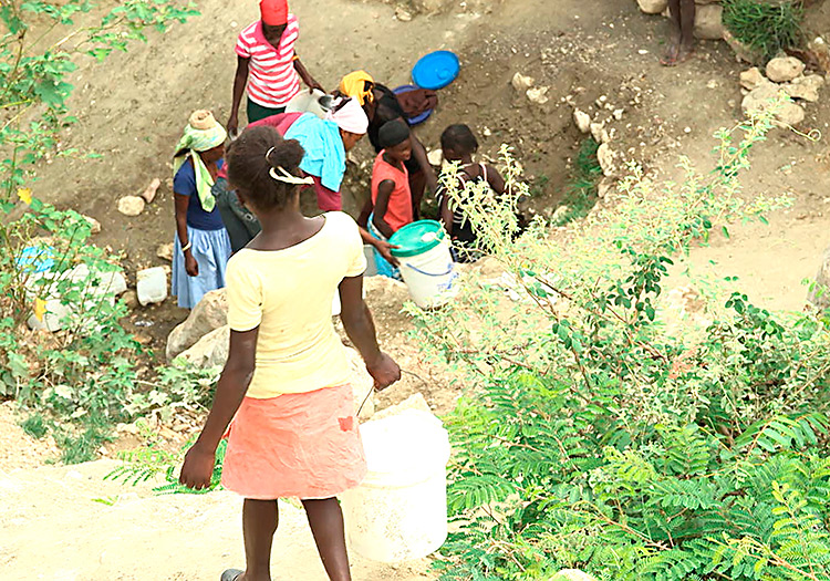 Haitian Children Carrying Water