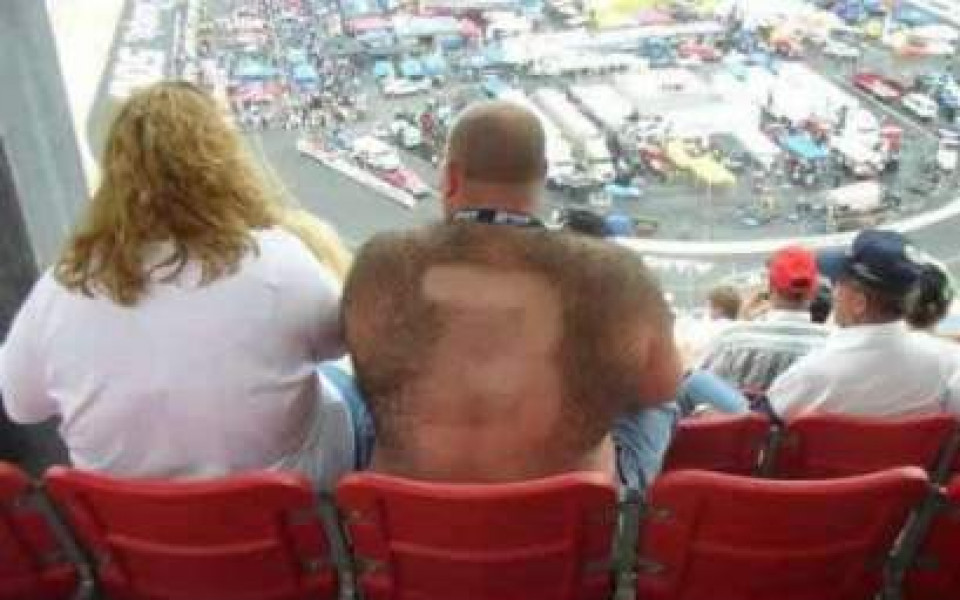 Man Wit Hthe Number 3 Shaved Into His Back