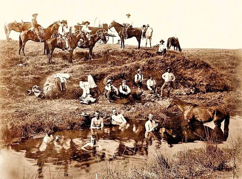 Cowboys Taking A Bath