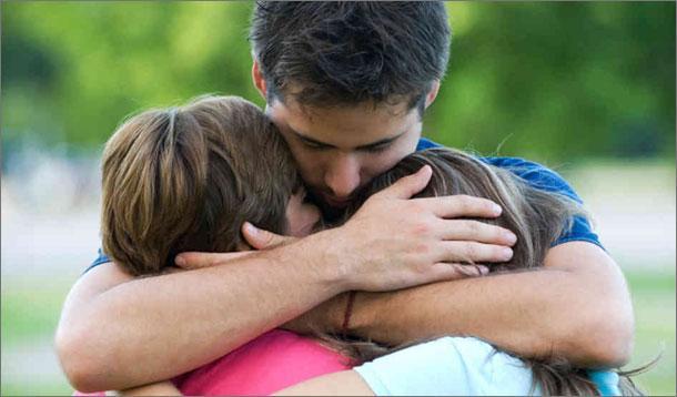 Father Hugging His Children